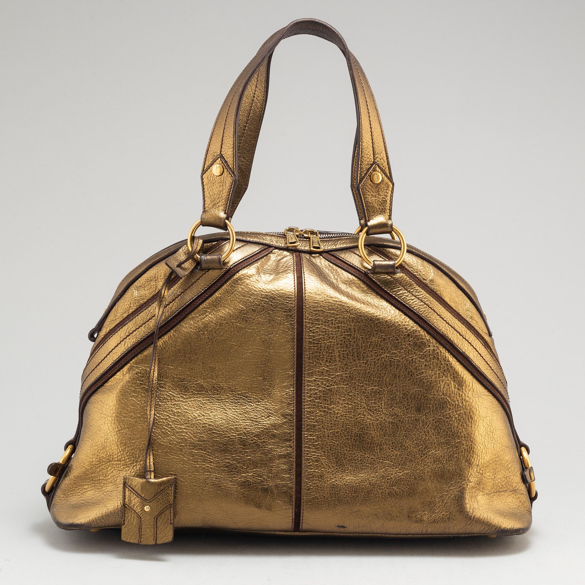 YVES SAINT LAURENT, a metallic bag.
