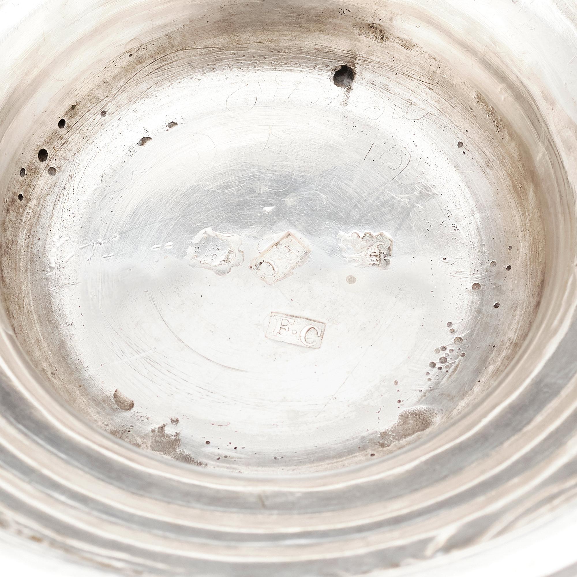 An English mid 18th century silver cup with lid, marks of Francis Crump, London.