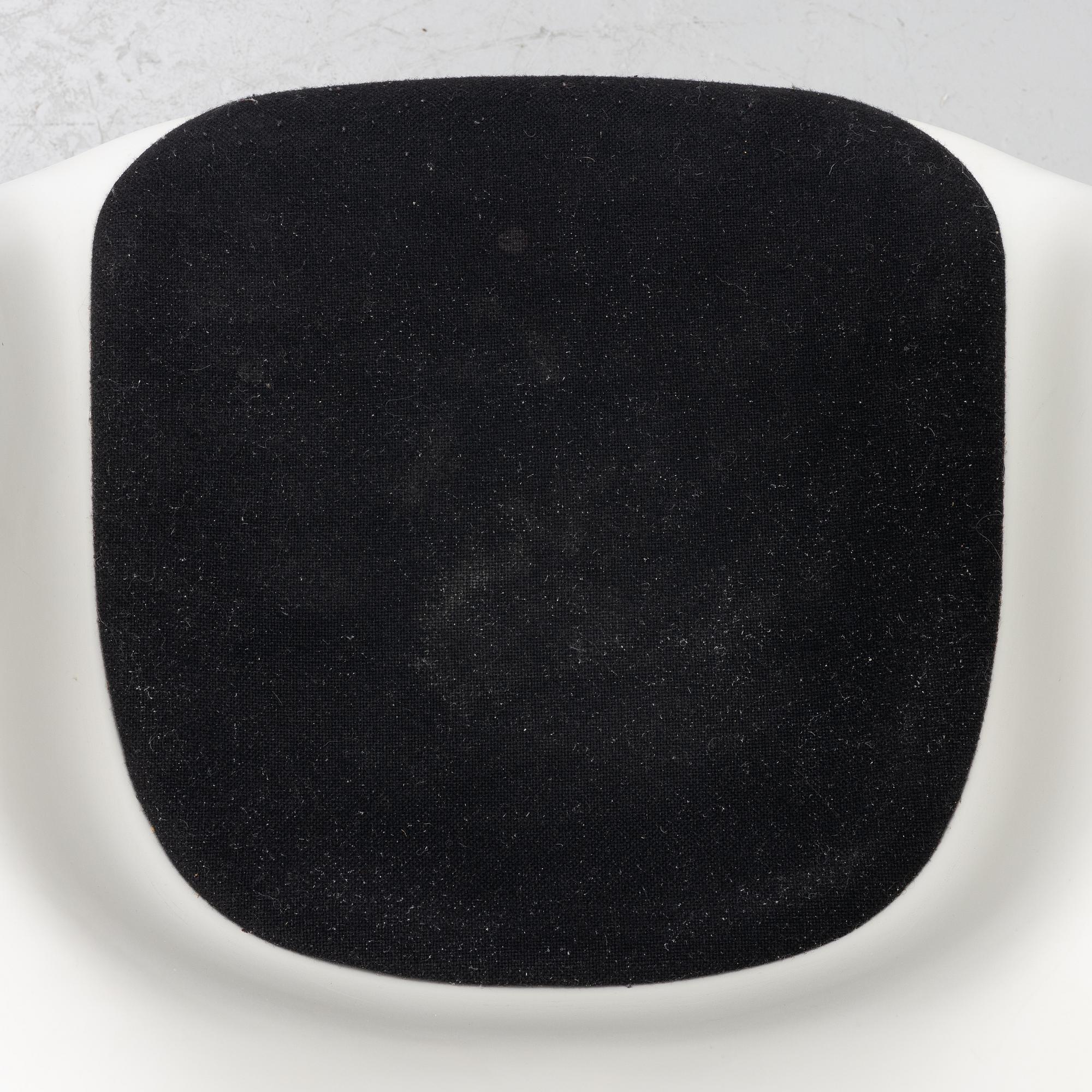 Charles & Ray Eames, a 'Plastic Chair PACC' desk chair, Vitra, 2010.