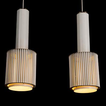 A pair of 'A 111' pendant lights for Valaistustyö.