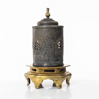 A silvered brass prayer container, Tibet, 20th century.