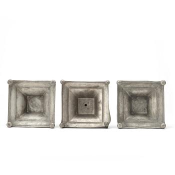 A sert of three late Gustavian pewter candlesticks by M Artedius 1800.