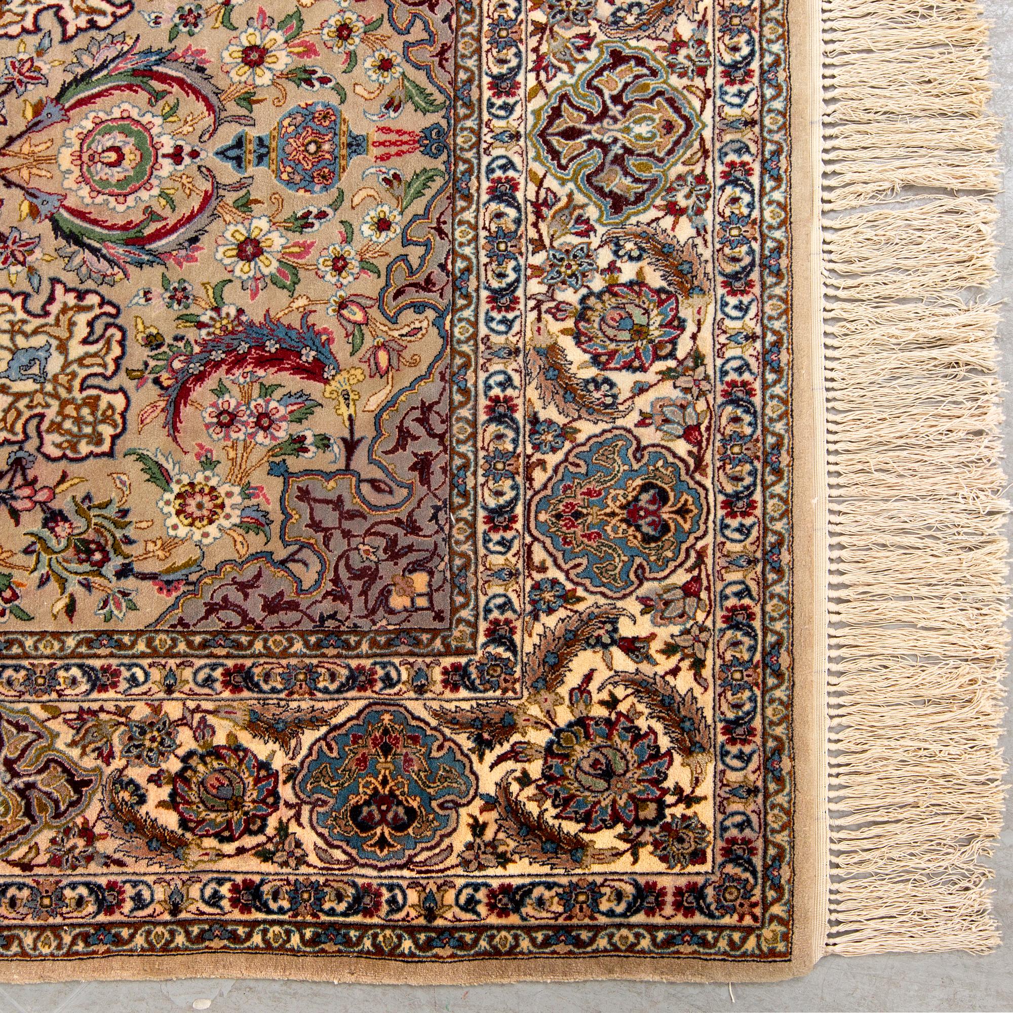 A signed isfahan part silk carpet ca 192 x 118 cm.