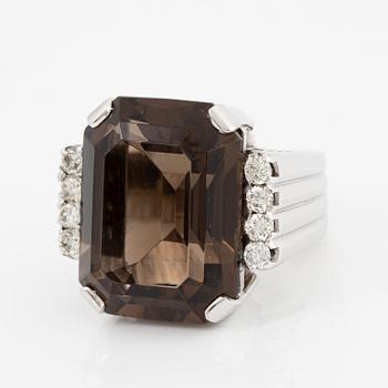 Ring, cocktail ring, 18K white gold with emerald-cut smoky quartz and brilliant-cut diamonds.