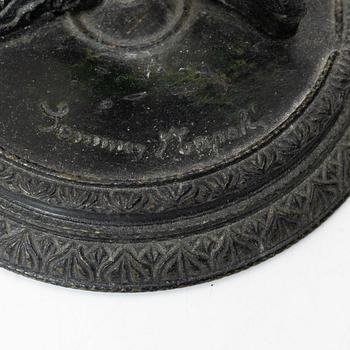 Two bronze sculptures.