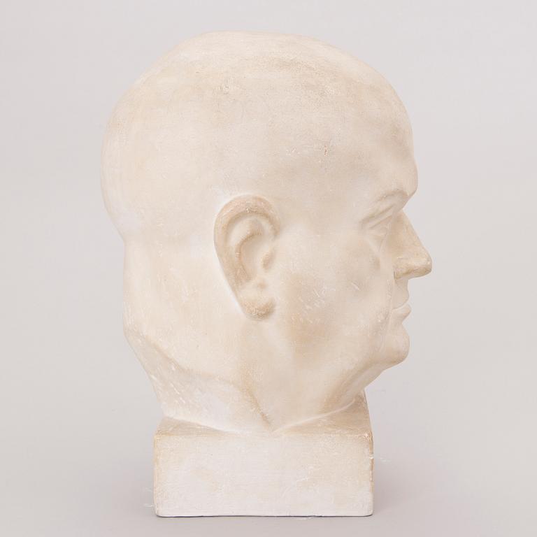 A plaster sculpture signed Mauno Oittinen 1929.