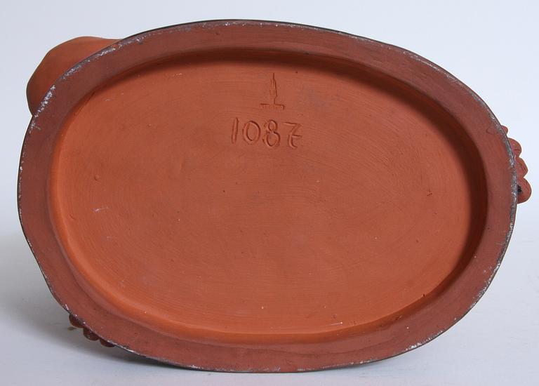 FIGURIN, kerakmik, "Keramia", monogramsign "MS", 1900-tal.