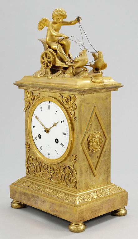 A French Empire mantel clock.