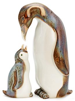337. Two Gunnar Nylund stoneware figures depicting a penguin mother with child, Rörstrand.