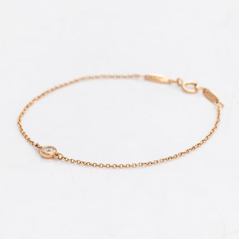 Tiffany & Co, Elsa Peretti, armband, 18K guld med en briljantslipad diamant   ca 0.07 ct.