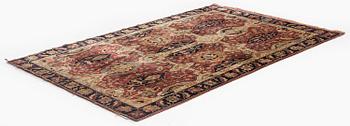 An antique Anatolian silk rug, c. 183 x 120 cm.