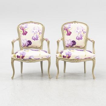 A pair of rococo style armchairs, 20th Century.