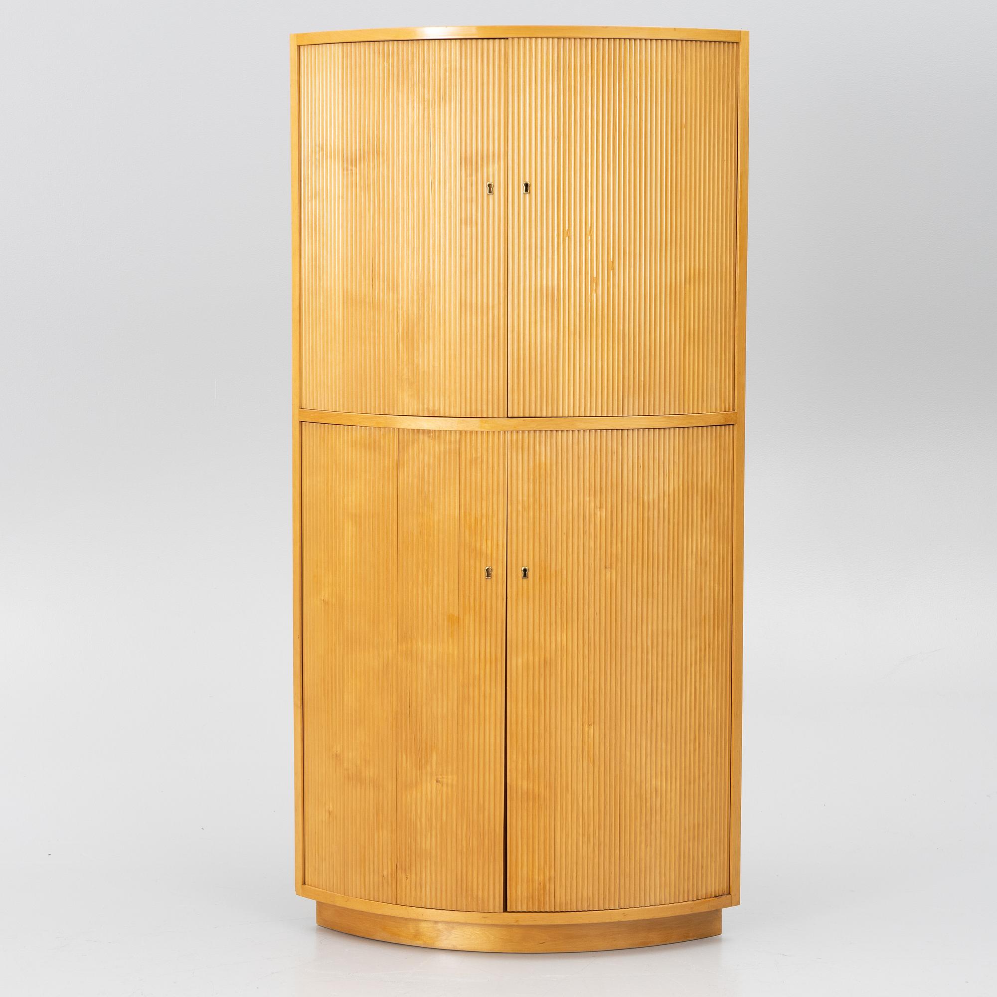 Corner cabinet, circa the mid-20th century.