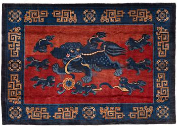 A CARPET, an old Baotou figural, China, ca 162,5 x 233,5 cm.