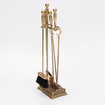 A five piece brass fire set, second half of the 20th Century.