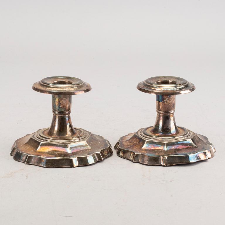 A set of three pair of Swedish 20th century silver candle sticks.