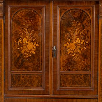 A dresser with cabinet, early 20th century.