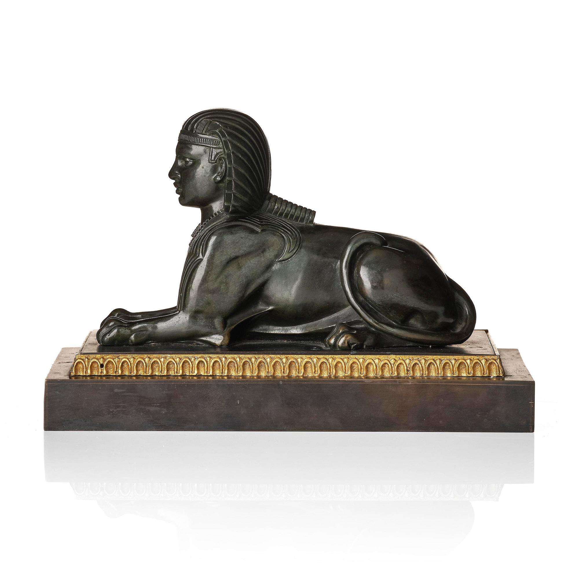 A French Empire bronze sfinx.