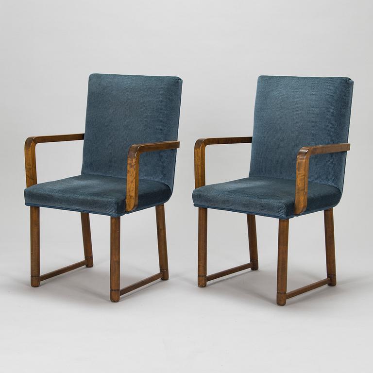 Eight 1930's open armchairs.