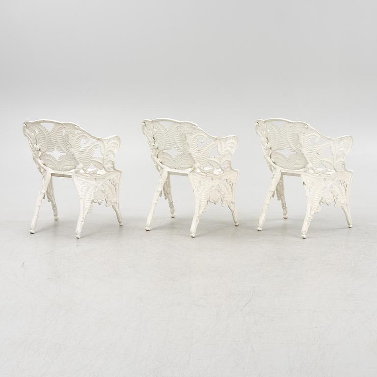 Three painted cast aluminium garden armchairs, second part of the 20th Century.