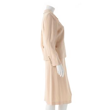 SONIA RYKIEL, a two-piece creme colored dress consisting of jacket and skirt.
