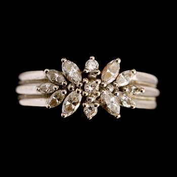 RING, 18 k vitguld, diamanter 0.62 ct enl gravyr. Total vikt ca 5 g.