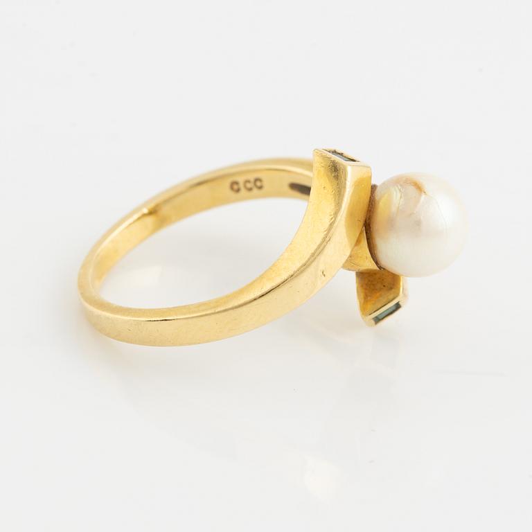 Cultured pearl and emerald ring.