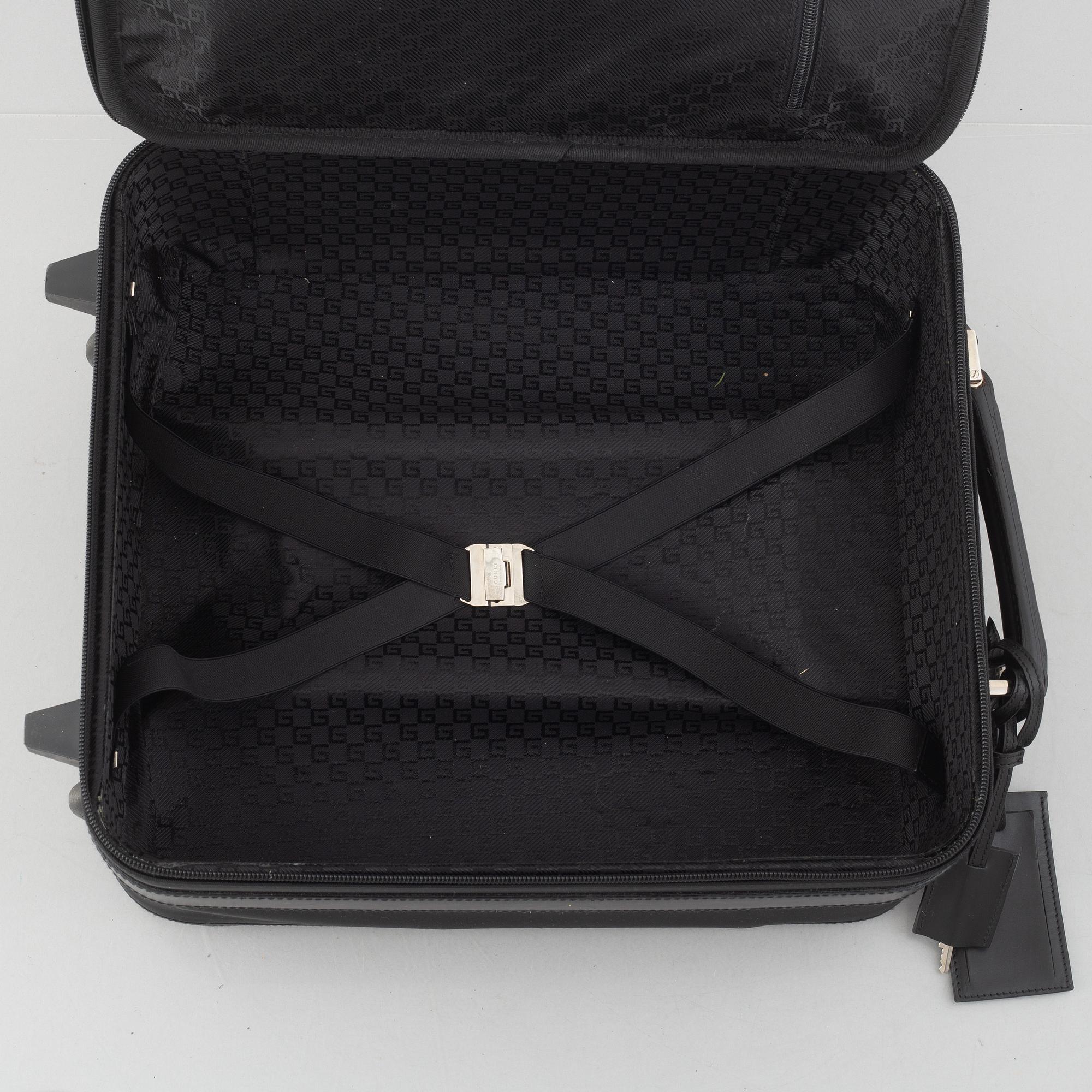 Gucci, suitcase/cabin bag.