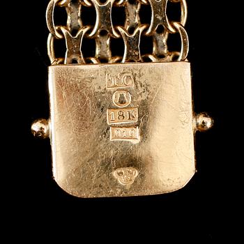 ARMBAND, 18 k guld, 1978. Vikt ca 18 gram.