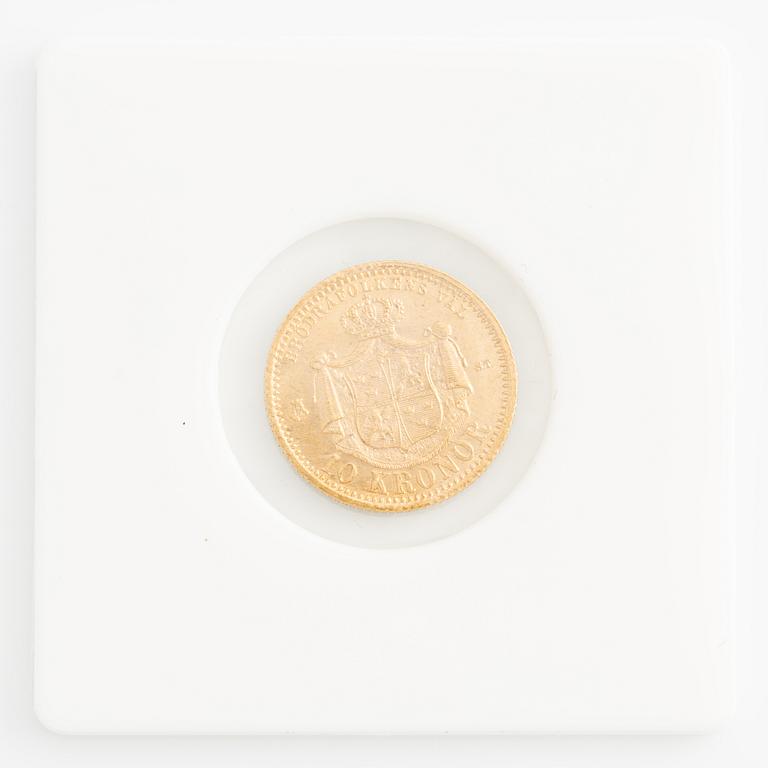 Two Swedish gold coins, 10 kronor and 5 kronor from 1874 and 1901.