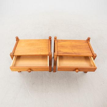 A pair of 1960s walnut bedside tables.