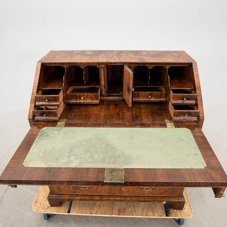 A walnut and mahogany writing bureau, mid-18th century late Baroque.