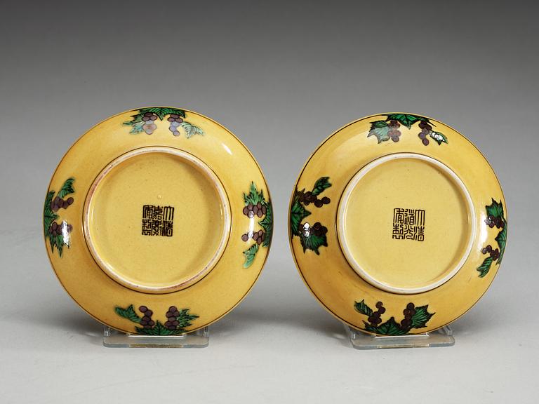 Two yellow ground dishes, Qing dynasty with Jiaqing sealmark (1796-1820) and Daoguangs sealmark and period (1821-1850).