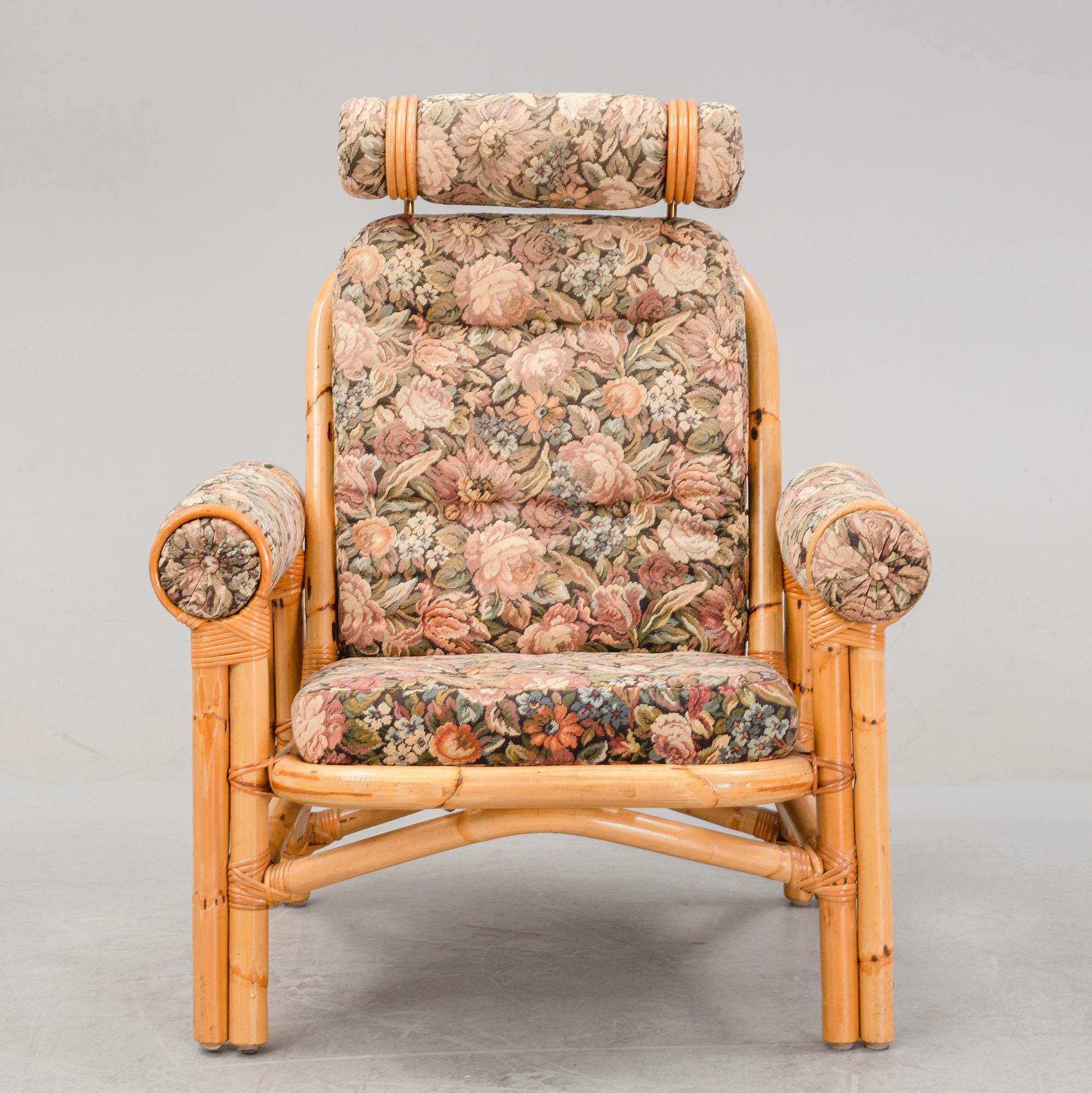 A set of two garden sofas, an armchair and a glass table, later part of the 20th Century.