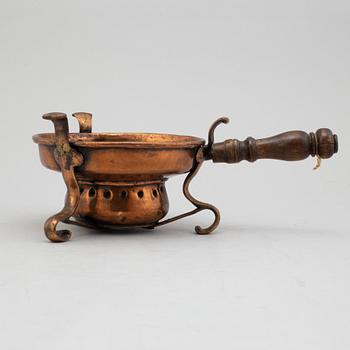 An 18th century copper firepan.