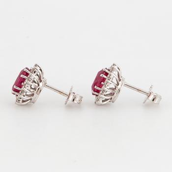 Ruby and brilliant-cut diamond earrings.