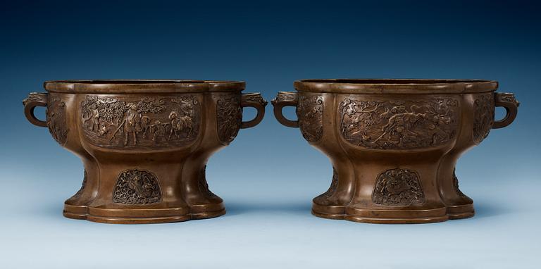 A pair of lobed bronze flower pots, Qing dynasty, with Xuandes six character mark to the interior.