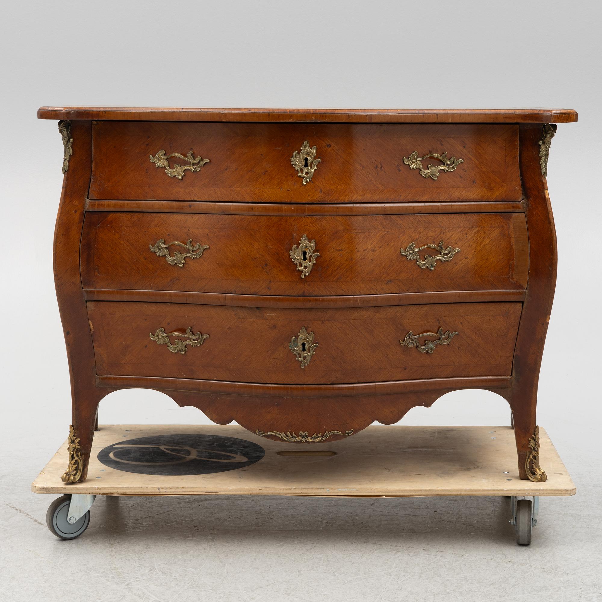 A Rococo chest of drawers, 18th Century.