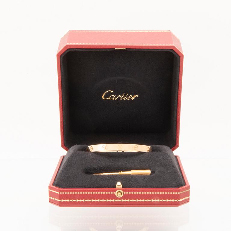 An 18K gold "Love" bracelet by Cartier.