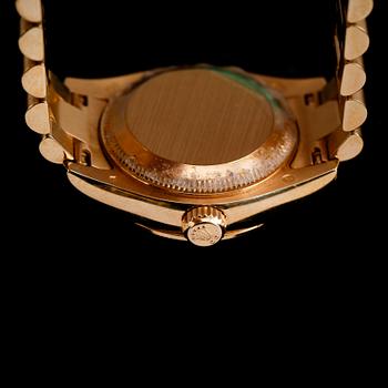 A Rolex Datejust ladie's wristwatch. 18K gold. Automatic. Ø 26 mm. Made circa 2008.