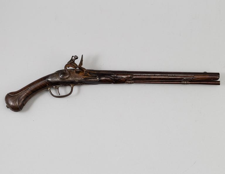 A Danish flint lock pistol signed, (Paul Nielsen Norrman, ca 1700).