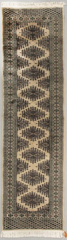 An old Pakistan carpet ca 283 x 81 cm.