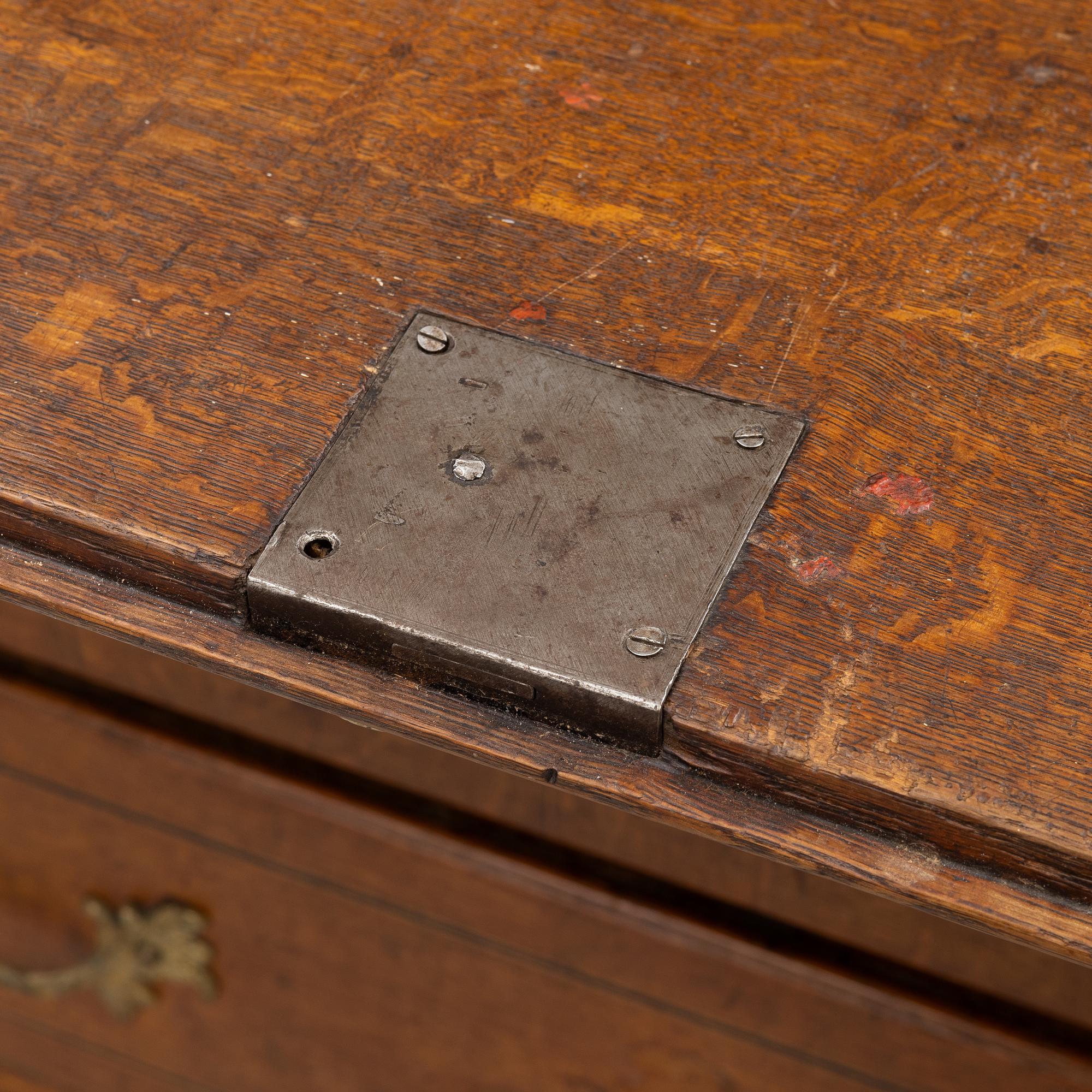 An oak secretaire, first half of the 19th century.