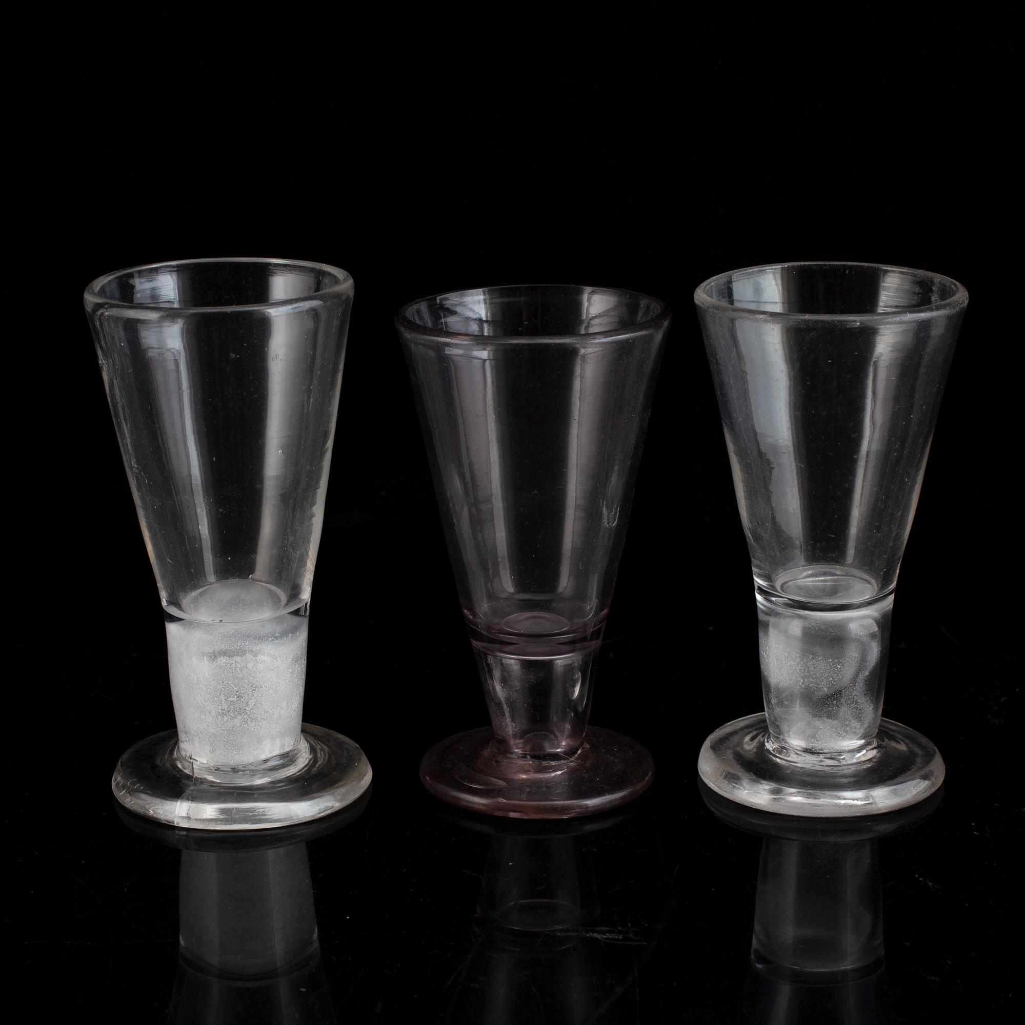 Six similar 18th century wine glasses.