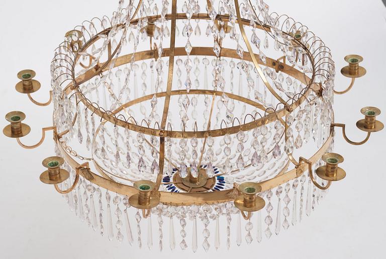 A late Gustavian gilt brass and cut glass thirteen-light chandelier, circa 1800.