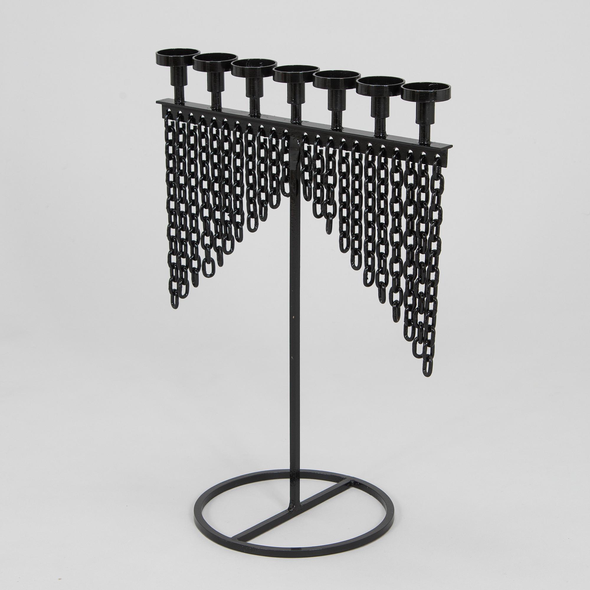 Kaija Aarikka, kynttilänjalka.