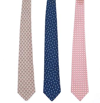 466. A set of three silk ties by Hermès.