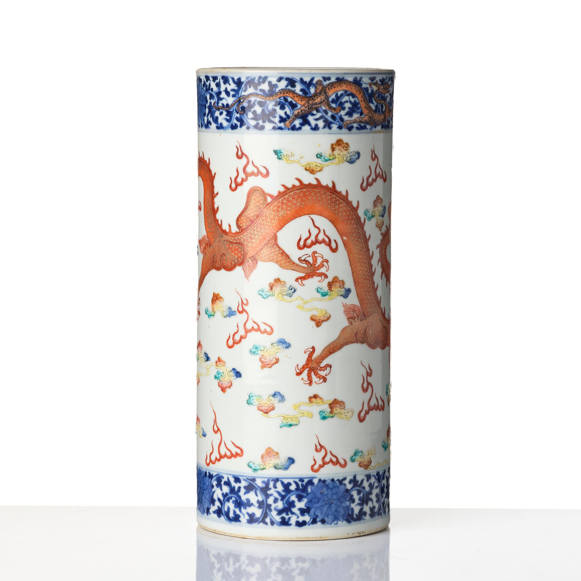 A Chinese 'dragon' porcelain brush stand, Qing dynasty, Guangxu mark and period (1875-1908).