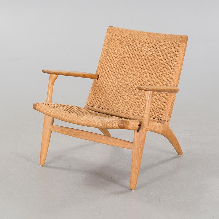 A lounge chair by Hans J Wegner, model "CH-25", for Carl Hansen & Son, Denmark, second half of the 20th century.
