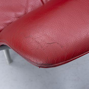 A pair of armchairs with footstool, "Timeout" by Conform, late 20th century.